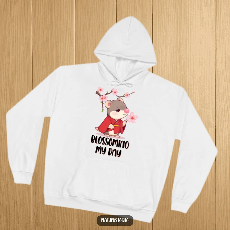 Funny Platypus Cherry Blossom Hoodie with a small platypus in a scarlet kimono curiously examining a blooming cherry blossom.