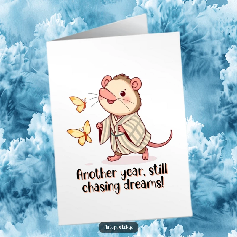 Funny Free Printable Birthday Card: Excited platypus in striped kimono chasing a paper butterfly