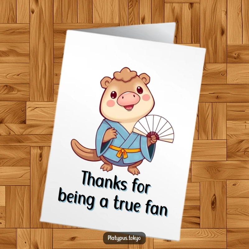 Funny Free Printable Thank You Card: a cheerful platypus in a blue kimono balances a fan on its bill, expressing happy thanks.